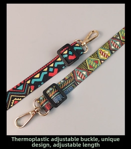 Detail of adjustable crossbody phone strap with ethnic pattern and gold metal hooks