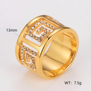 Luxury gold hollow ring with sparkling rhinestones and classic fret pattern design
