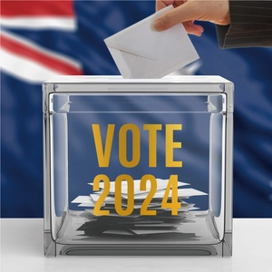 2-inch gold leaf alphabet stickers showing VOTE 2024 design on a transparent glass box