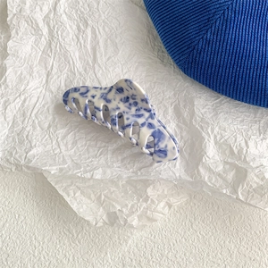 Blue and white marble pattern large hair claw clip made of glossy acetate resin