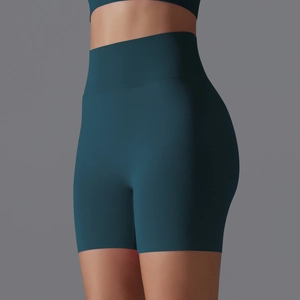 Detail of high-waist seamless ribbed yoga shorts showing fabric texture and compression fit