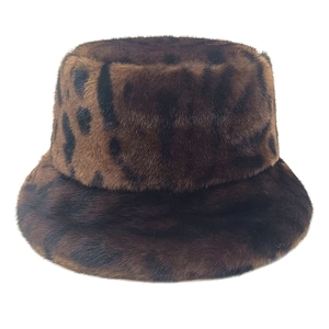 Faux fur leopard print bucket hat for women with fluffy plush texture and warm winter design
