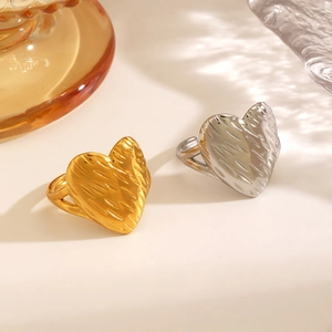 Minimalist 18K gold and silver plated stainless steel heart rings with brushed texture