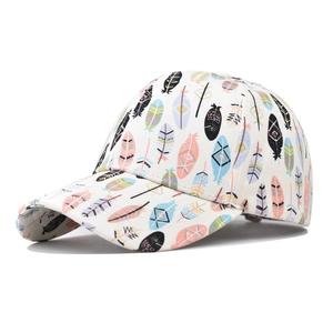 White cotton baseball cap featuring colorful feather prints with tribal geometric details