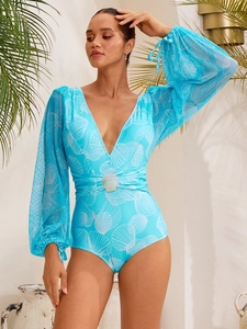 Detail of sky blue V-neck swimsuit with mesh lantern sleeves and seashell buckle