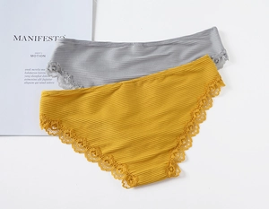 Detailed shot of grey and yellow ribbed cotton panties with delicate floral lace trim