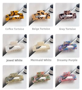 Macro showcase of nine vintage tortoiseshell and marble acetate hair claw clip styles