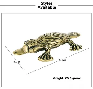 Detail view of vintage brass platypus figurine with dimensions 5.5cm by 3.3cm