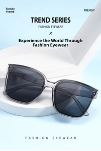 Detail of trendy ice grey square sunglasses with UV protection and dual rivet accents