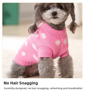 Close-up of pink polka dot knit dog sweater with high collar design for small pets