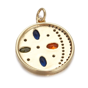 Close-up of gold evil eye pendant with colorful gemstones and intricate star detailing