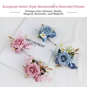 Detailed close-up of pink and blue silk boutonnieres with elegant pearl wrist corsages
