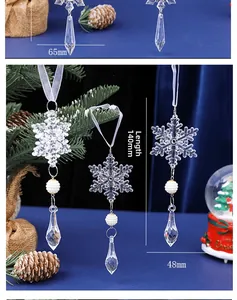Macro detail of acrylic Christmas snowflake ornaments with pearls on blue velvet background