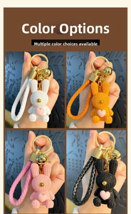 Detail of cute resin rabbit keychains with woven straps and heart details in four colors