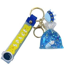 Blauer Segelboot-Schlüsselanhänger mit flüssiger Treibflasche und Weltraum-Silikonband