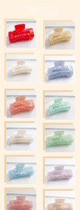 Selection of vibrant candy-colored square acetate hair claw clips with marble texture