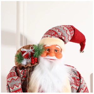 Detail of standing Santa doll with knitted hat, glasses, and miniature gift bag decor