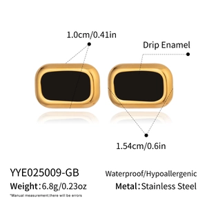 Detail view of rectangular black enamel stud earrings with stainless steel gold plating