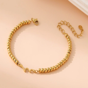 Minimalist gold stainless steel beaded wave bracelet with lobster clasp and adjustable chain