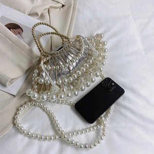 Retro hollow pearl handbag with silver drawstring liner and metal bead handle