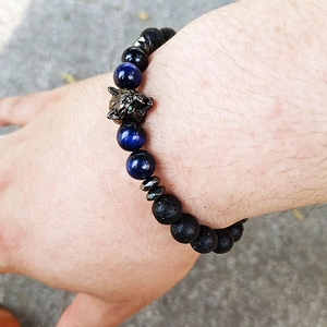 Men's adjustable tiger eye and obsidian beaded bracelet with detailed metal wolf head