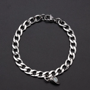 Polished silver stainless steel Cuban link bracelet with magnetic heart charm for couples