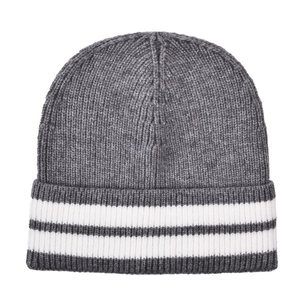Close-up of the thick rib-knit texture and white athletic stripes on the gray beanie