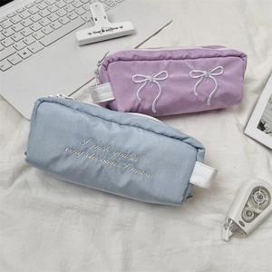 Large capacity aesthetic bow embroidery pencil cases in blue and purple pastel tones