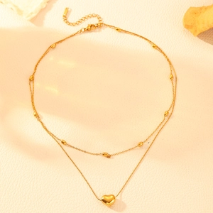 Double-layered gold titanium steel heart pendant necklace with beads and lobster clasp