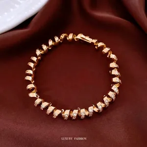 Luxurious 18K gold plated twisted chain bracelet with shimmering pave set zircon stones