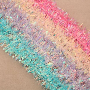 Detail of pink and blue iridescent tinsel garland with vibrant metallic reflection