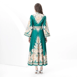 Retro long dress with dark green paisley print and flared sleeves, elegant back view