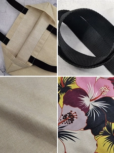 Detail view of cat tote bag materials including linen texture and black woven straps