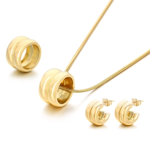 Golden double-layer round pendant necklace and earrings set with sleek snake chain