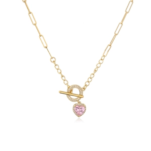 Detail of 18K gold OT buckle necklace with a pink heart pendant and micro-pave crystals