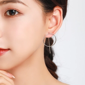 Chic 925 sterling silver geometric circle earrings with drop bar shown on a model