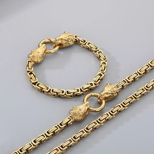 Detail of gold Byzantine chain necklace and bracelet set with lion head connector