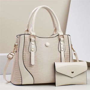 Cream patent leather tote bag set with crocodile texture and gold hardware accessories