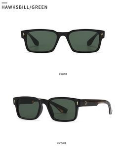 Detail view of square tortoiseshell sunglasses with dark green lenses and golden accents