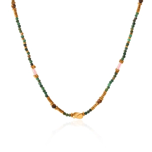 Detail view of colorful beaded necklace with a golden leaf pendant and metallic spacers
