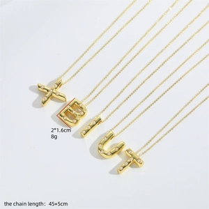 Gold letter necklace with pearl inlay, 45cm chain length, 2x1.6cm pendant size details