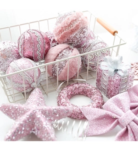 Detailed collection of pink Christmas ornaments with glitter, sequins and faux fur textures