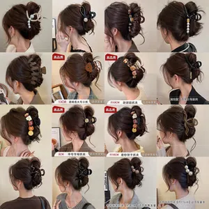 Griglia dettagliata di mollette per capelli in pizzo nero in varie misure da 8cm a 13cm