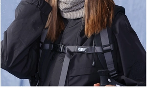Detail of buckle strap and warm fleece lining on black winter outdoor neck warmer set