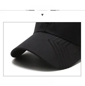 Detail of black sports baseball cap brim with textured fabric and SPORT embossed logo
