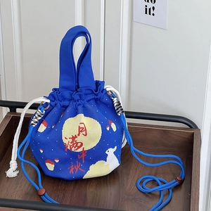 Blue knitted drawstring bag with white moon and rabbit pattern for Mid-Autumn festival