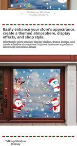 Detailed Christmas window decals featuring Santa, reindeer and penguins on a glass shop door