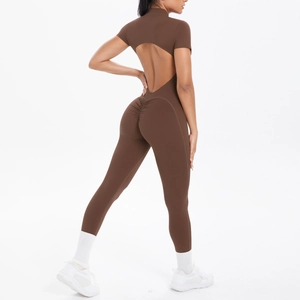 Detailed back view of dark brown backless jumpsuit with ruched booty and short sleeves