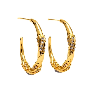 Elegant 18K gold plated C-shaped twisted hoop earrings with zircon stones on white background