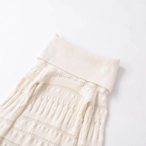 Chic off-shoulder knit sweater with turtleneck and elegant hollow-out details
